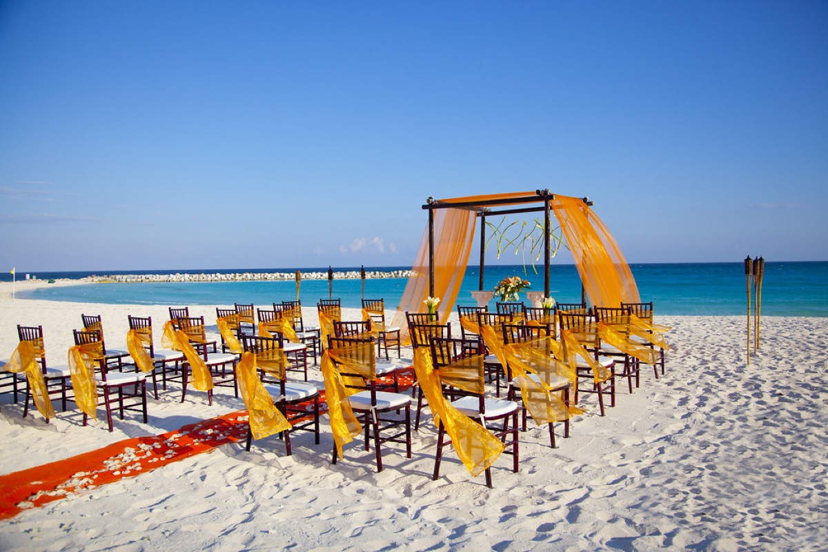 Cancun beach with umbrella and chair