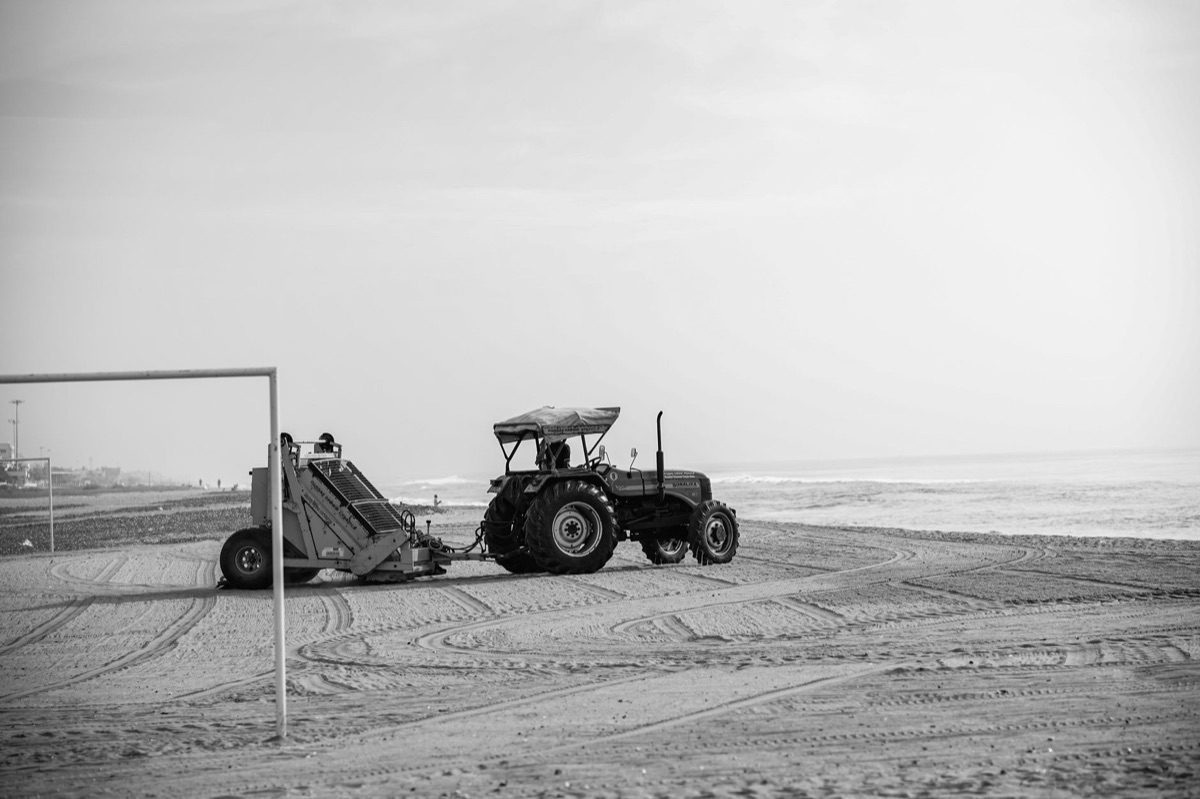 Sargassum cleanup tools and workers