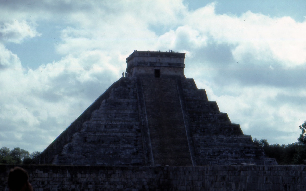 Maya temple staircase with sunlit steps leading to the jungle