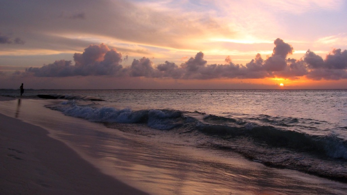 Beach of Isla Mujer, Cancun, Mexico, with clear blue water and white sand