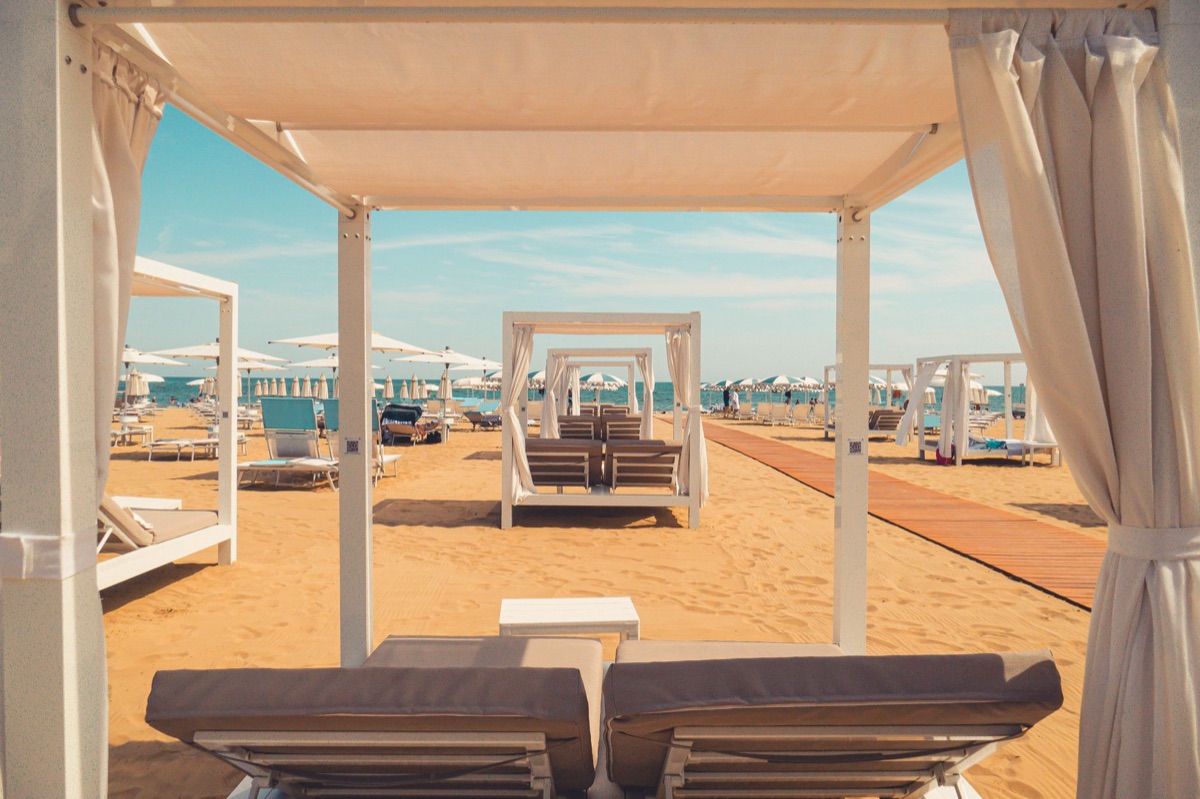 resort beach with private cabanas
