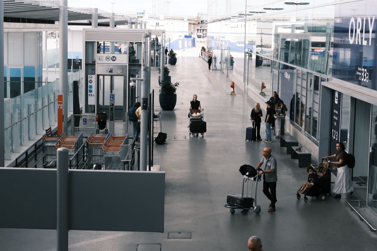 Cancun International Airport terminal with luggage