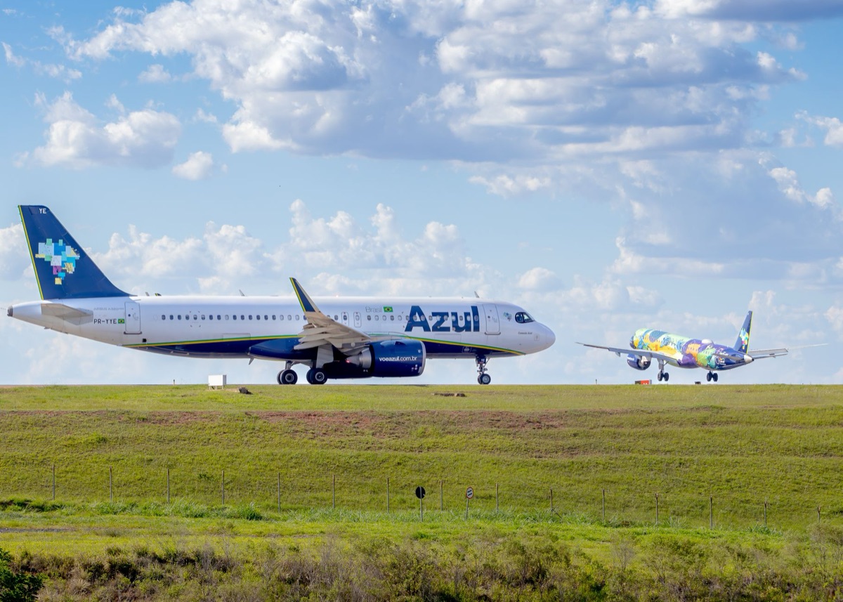 Airline planes at Cancun airport with different brands and colors